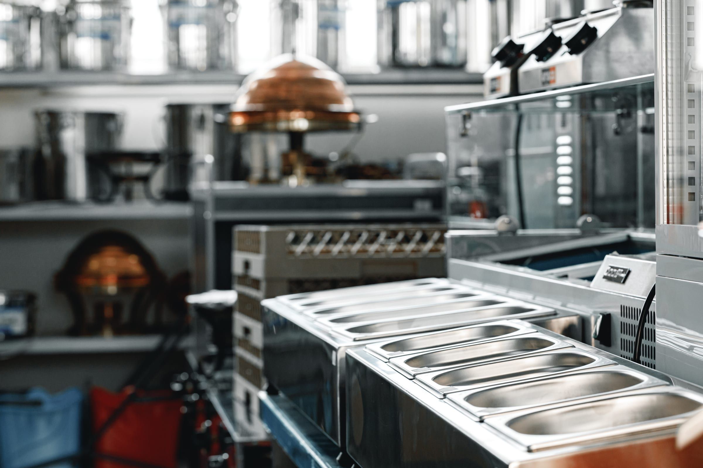 Prep line with hotel pans and equipment
